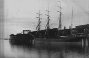 Coal dock masted ship